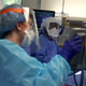 Doctors working on a covid-19 patient at Regional Medical Center in San Jose, May 21, 2020.